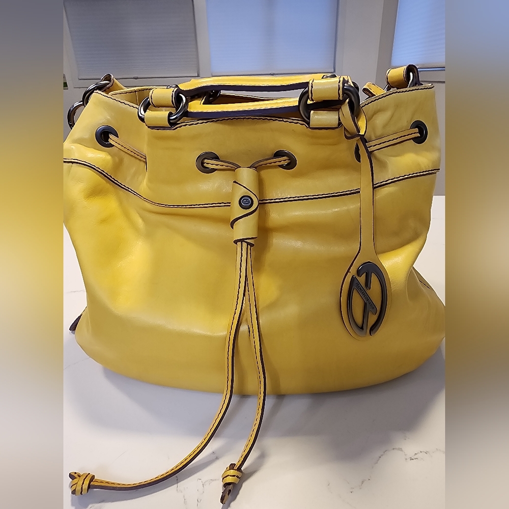 Vibrant Yellow Hobo Bag with Textured Leather and Gold Hardware
